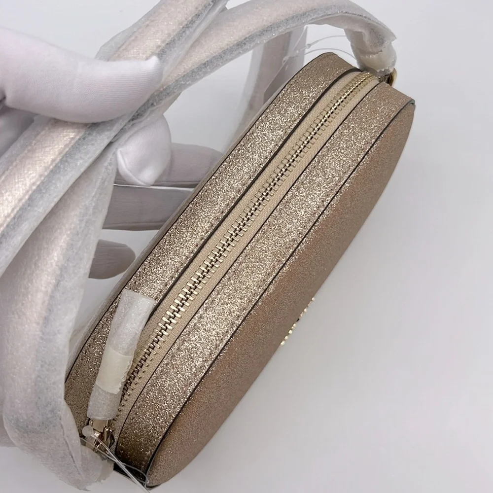 Kate Spade Glimmer Oval Camera Bag Gold